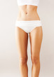 Slim tanned woman's body