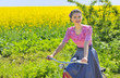 Photo: girl on bike in spring time girl on bike in spring time
