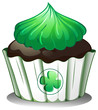 A cupcake with a green icing
