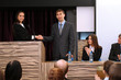 Business people at tribune in conference room