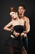 Foto: Couple in love. Happy loving couple. Dark background. Couple in love. Happy loving couple. Dark background.