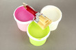 Set for painting: paint pot, brushes on grey background