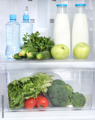 Photo: Open refrigerator with vegetarian food Open refrigerator with vegetarian food