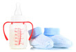 Bottle for milk formula with booties isolated on white