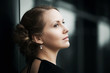 Beautiful woman daydreaming