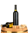 Wine and corks on barrel isolated on white