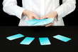 Hand with business cards. Concept: Business like poker game.