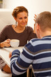 Young couple in coffee shop