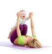 mother with baby doing gymnastics and fitness exercises