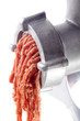 Foto: minced meat comes fresh from a mincer minced meat comes fresh from a mincer