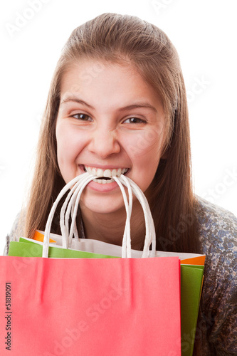 Photo: Teenager girl with shopping bags Teenager girl with shopping bags