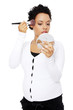 Photo: Pregnant woman doing a makeup. Pregnant woman doing a makeup.