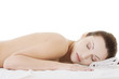 Photo: Beauty woman relaxing in spa Beauty woman relaxing in spa