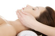 Photo: Woman enjoy receiving face massage Woman enjoy receiving face massage