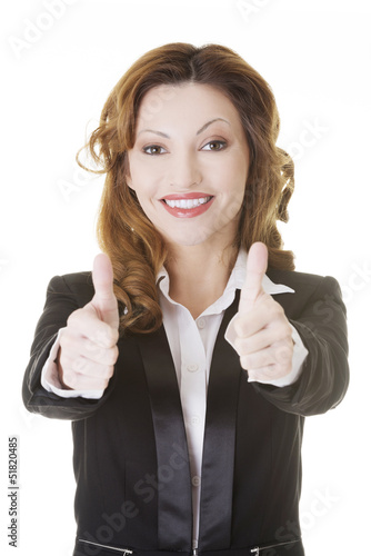 Photo: Business woman with thumbs up, ok gesture Business woman with thumbs up, ok gesture