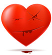 Red glossy heart with cuts