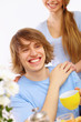 Young happy man drinking tea