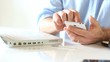 Closeup of man typing text on smartphone