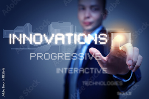 Photo: Business man touching display Business man touching display