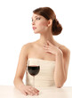 Photo: Beautiful brunet girl drinking red wine Beautiful brunet girl drinking red wine