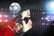Goalkeeper catches the ball