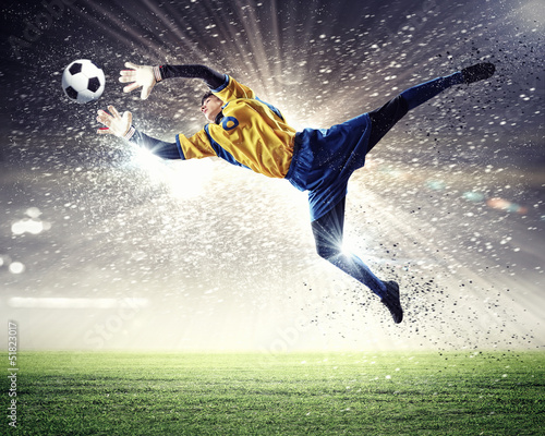 Photo: Goalkeeper catches the ball Goalkeeper catches the ball