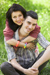 Couple Relaxing on Green grass
