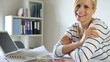 Woman in office looking at camera