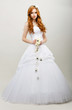 Photo : Redhaired Bride in White Bridal Dress. Wedding Fashion Redhaired Bride in White Bridal Dress. Wedding Fashion