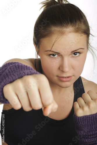 Photo: Young attractive woman showing boxing motion Young attractive woman showing boxing motion