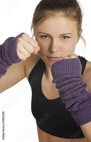 Photo: Young attractive woman showing boxing motion Young attractive woman showing boxing motion