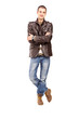 Full length portrait of a casual guy posing