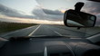 Driving on motorway during sunset, time laps