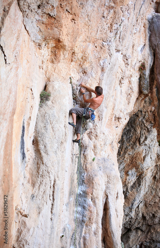 Photo: Rock climber on a cliff Rock climber on a cliff