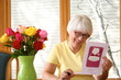Woman With Flowers And Card