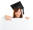 Photo: Graduate student showing blank placard Graduate student showing blank placard