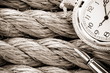 watch with pen on ship ropes