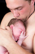 Loving father and baby