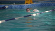 Little girl swimming in the pool.