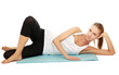 A sportive young woman lying on the floor
