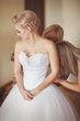 Beautiful bride in wedding dress with bouquet bridal flowers