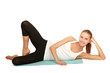 A sportive young woman lying on the floor