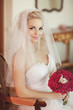 Beautiful bride in wedding dress with bouquet bridal flowers