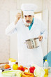 Photo: Caucasian chef tasting soup Caucasian chef tasting soup