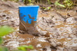 Gum boot stuck in dirt