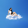 beautiful brunette on a cloud