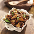 rosemary herb potatoes in white baking dish.
