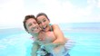 Couple having fun in swimming-pool