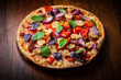 Foto: Homemade pizza with dried tomatoes and salami Homemade pizza with dried tomatoes and salami