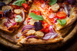 Foto: Homemade pizza with dried tomatoes and salami Homemade pizza with dried tomatoes and salami